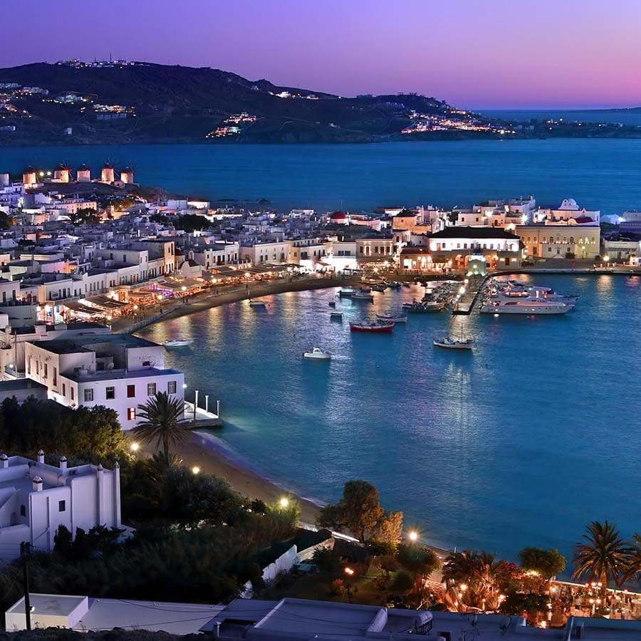 01.primary-IMG-DEST-MYKONOS-GREECE-Cosmic-Rhythm-Moonlit-Beats-Mykonos-Streets-UNCROPPED