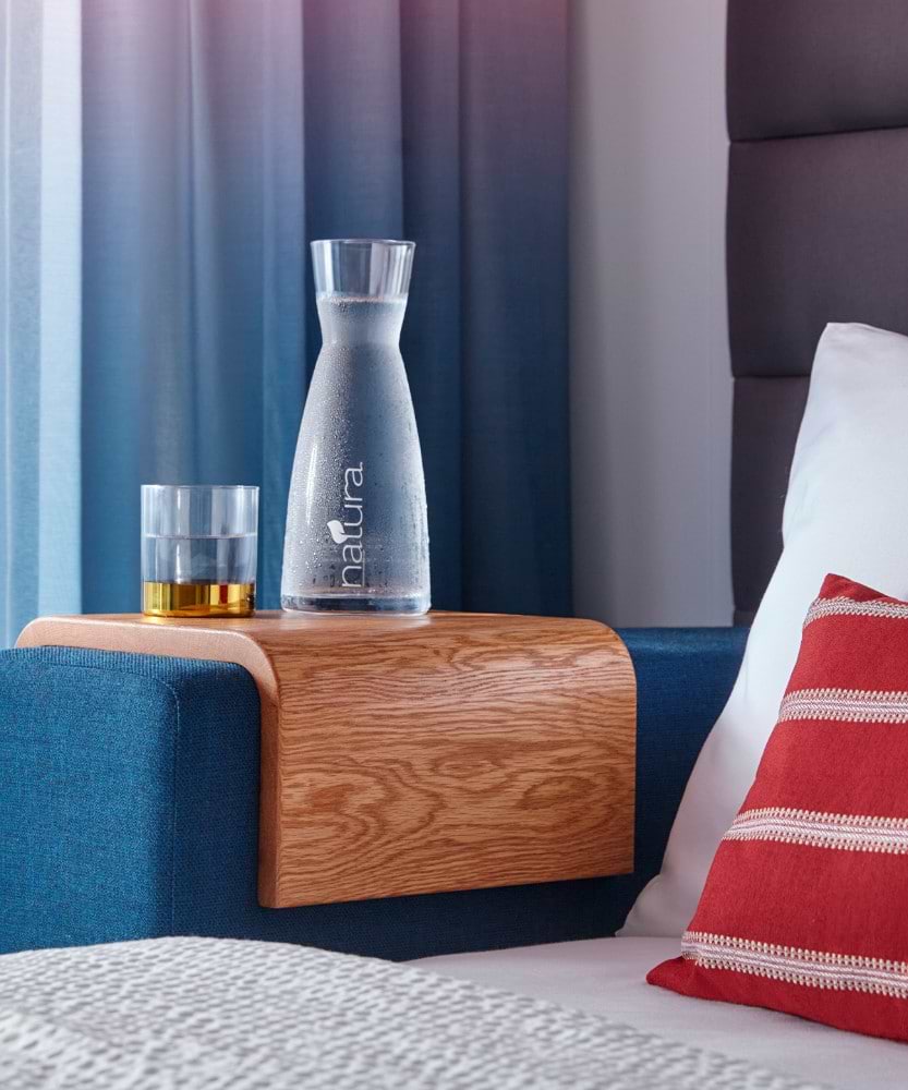 water pitcher and glass cup on stand
