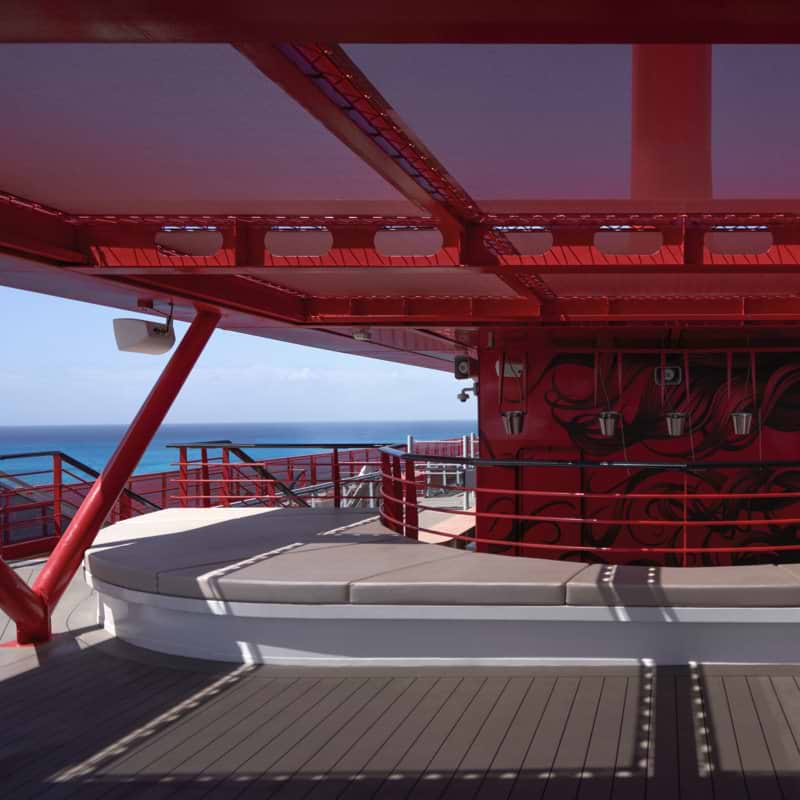 Sitting area with red sunroof at ship