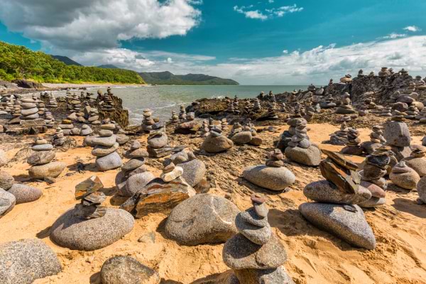Stacked balancing rocks on the beach