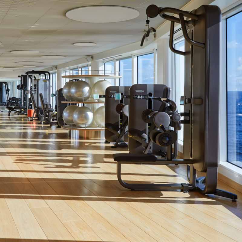 Gym with windows by the sea
