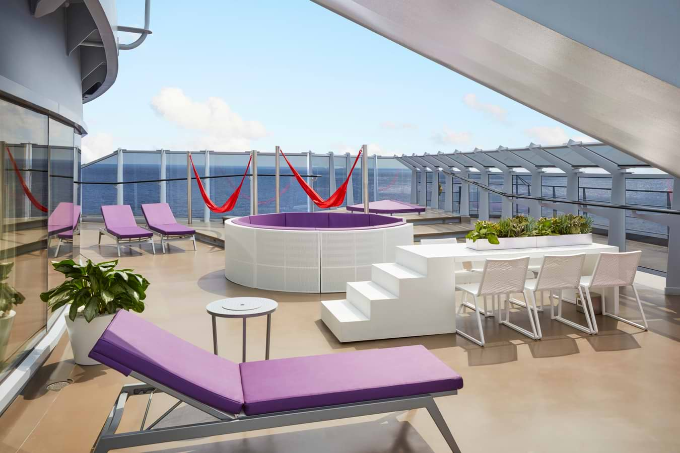 The Massive Suite features the largest terrace space, runway table, hammocks, loungers, and a stargazing lounge for those cosmic nights at sea.