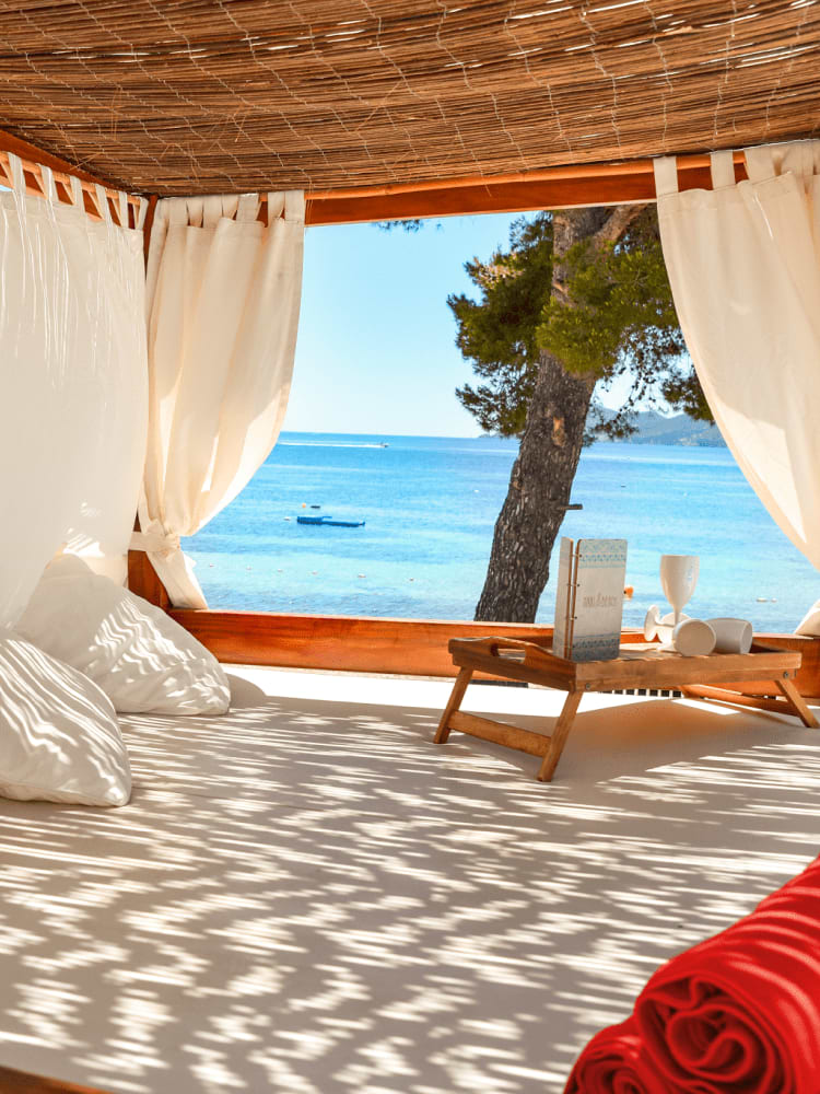 Beach bed with ocean background