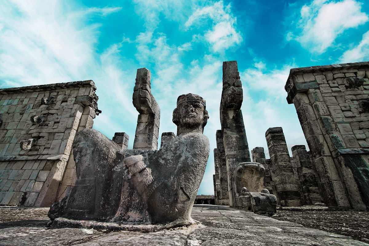 Mayan statue and mayan ruins site 