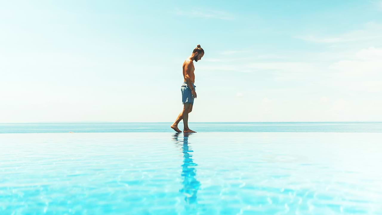 Man on swimming pool