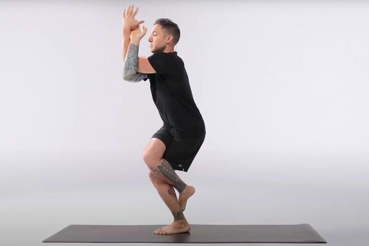 The eagle posture (Garudasana) 