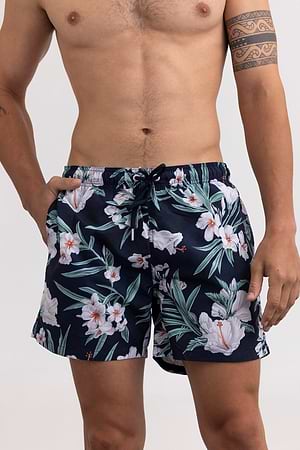 GANT swimshort navy בגד ים בצבע כחול כהה פרחים לבנים ירוקים