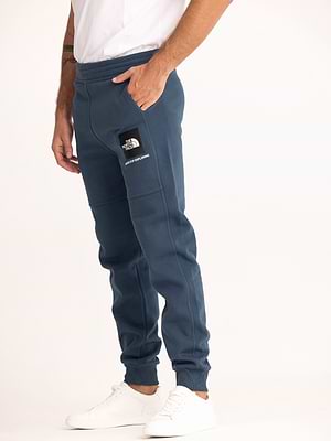 THE NORTH FACE long pants blue small logo מכנס טרנינג ארוך בצבע כחול פטרול עם ריבוע לוגו קטן