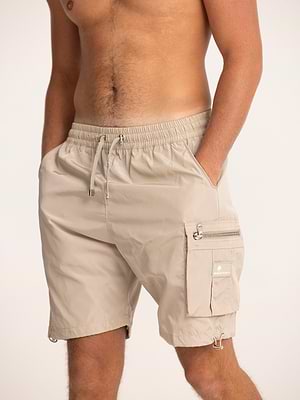 PALM MYKONOS beige short pants דגמח קצר ניילון בצבע בז' עם רוכסן צידי ולוגו המותג