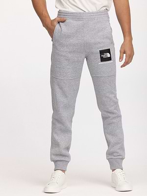 THE NORTH FACE long pants light gray small logoמכנס טרנינג ארוך בצבע אפור עם ריבוע המותג