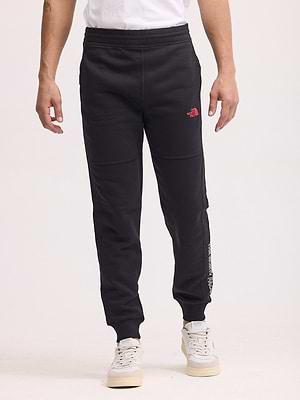THE NORTH FACE long pants small logo מכנס טרנינג ארוך בצבע שחור עם לוגו קטן אדום - m