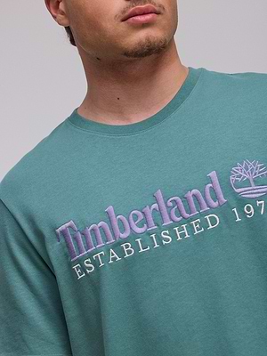 TIMBERLAND  logo t shirt חולצה בצבע טורקיז עם לוגו סגול במרכז המוצר