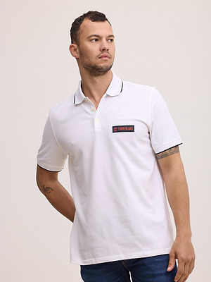 TIMBERLAND white polo פולו בצבע לבן עם פס בצווארון ולוגו צידי