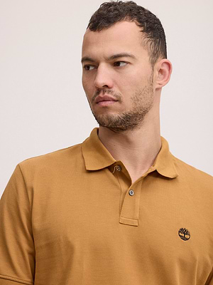 TIMBERLAND yellow polo פולו בצבע צהוב חרדל מעושן עם לוגו המותג עיגול
