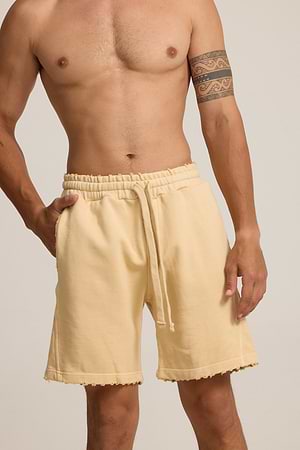 PALM MYKONOS beige banana short pants מכנס בז' בננה אוברסייז קרעים (חלק מסט)