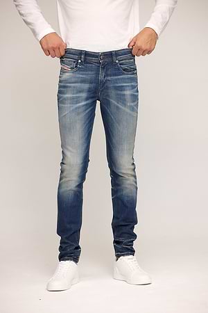 DIESEL jeans sleenker גינס בצבע כחול בהיר משופשף פנסים 09P59